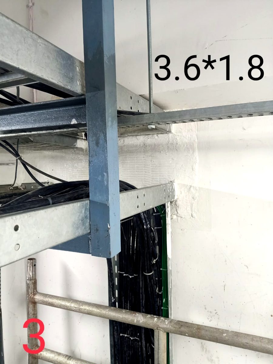 Cable tray penetration measured and marked for firestopping