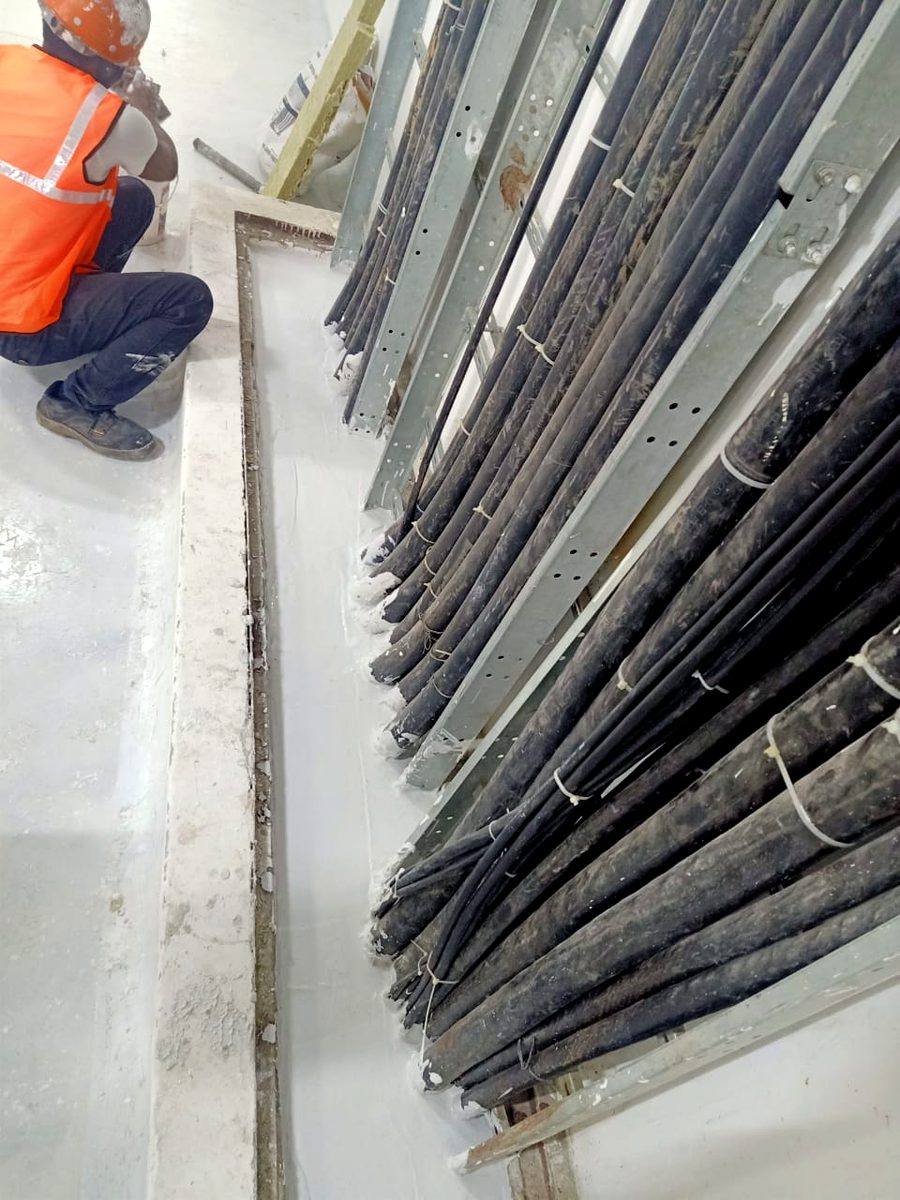 Fire safety audit — unsealed cable riser penetration identified during site survey